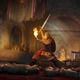 An Assassin's Creed character is using a sword and torch to ward off what appears to be plague rats in an opulent cathedral.